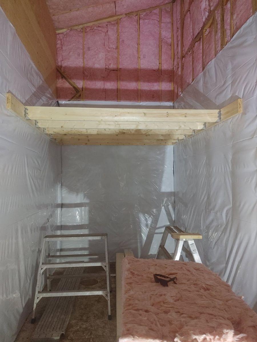 Insulation and vapour barrier, with a storage loft framed in